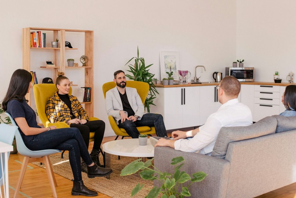 Small Business having a coaching session in an open office